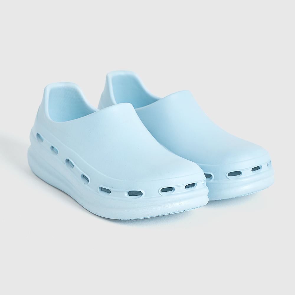NurFit NURSTEP nursing shoe in blue, crafted with breathable materials and slip-resistant technology for healthcare professionals.